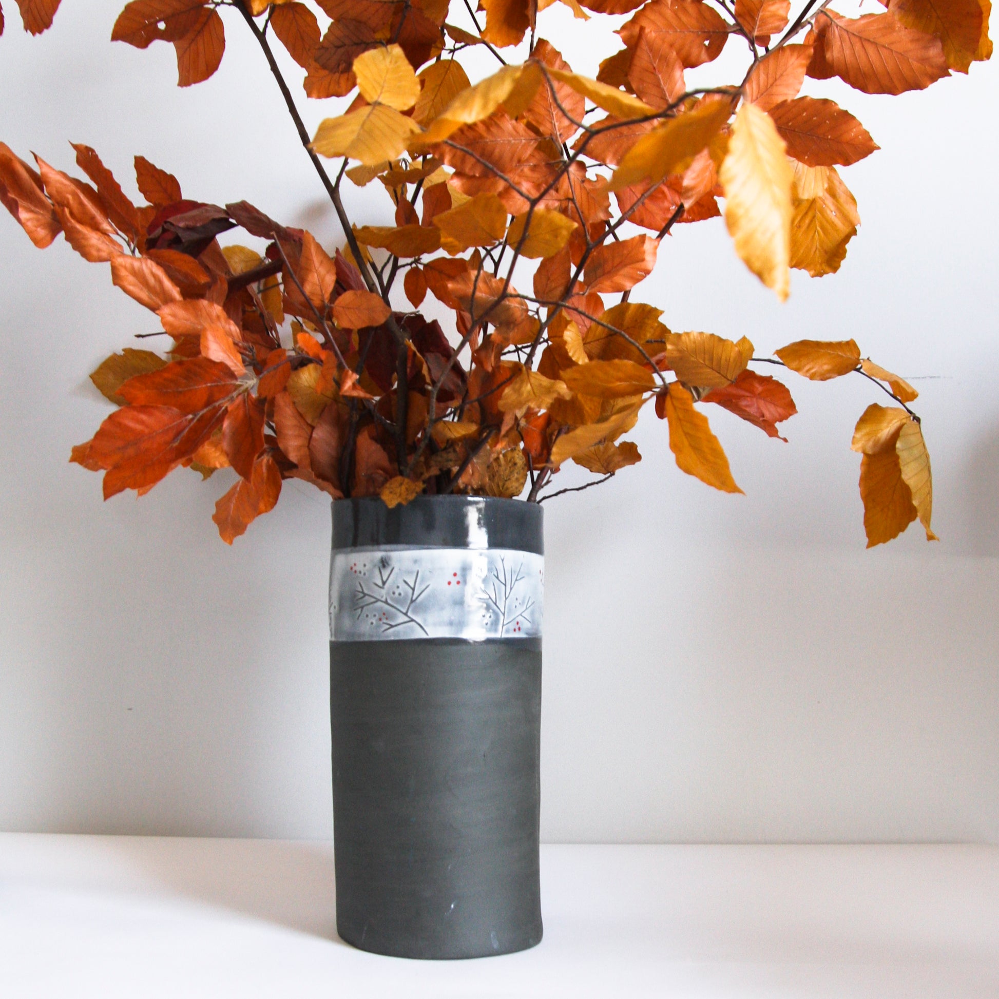 Black Vase with Relief Design