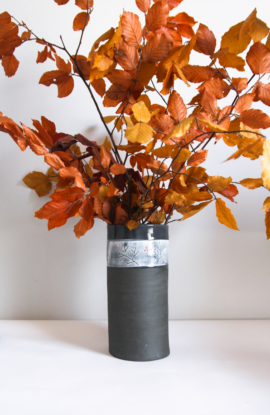 Black Vase with Relief Design