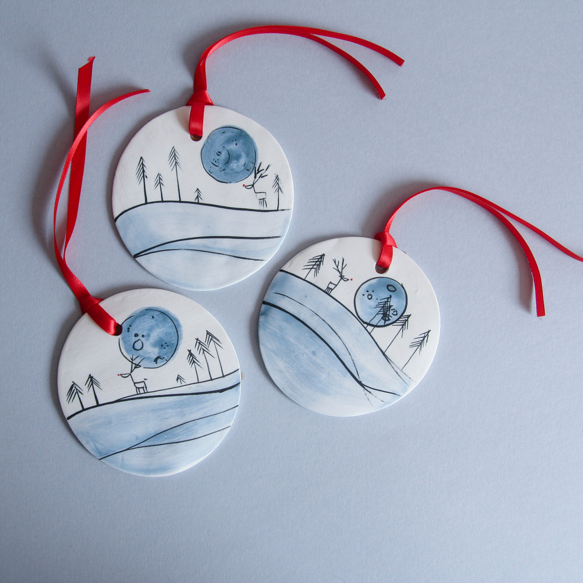 Reindeer and Full Moon Disc Ornament