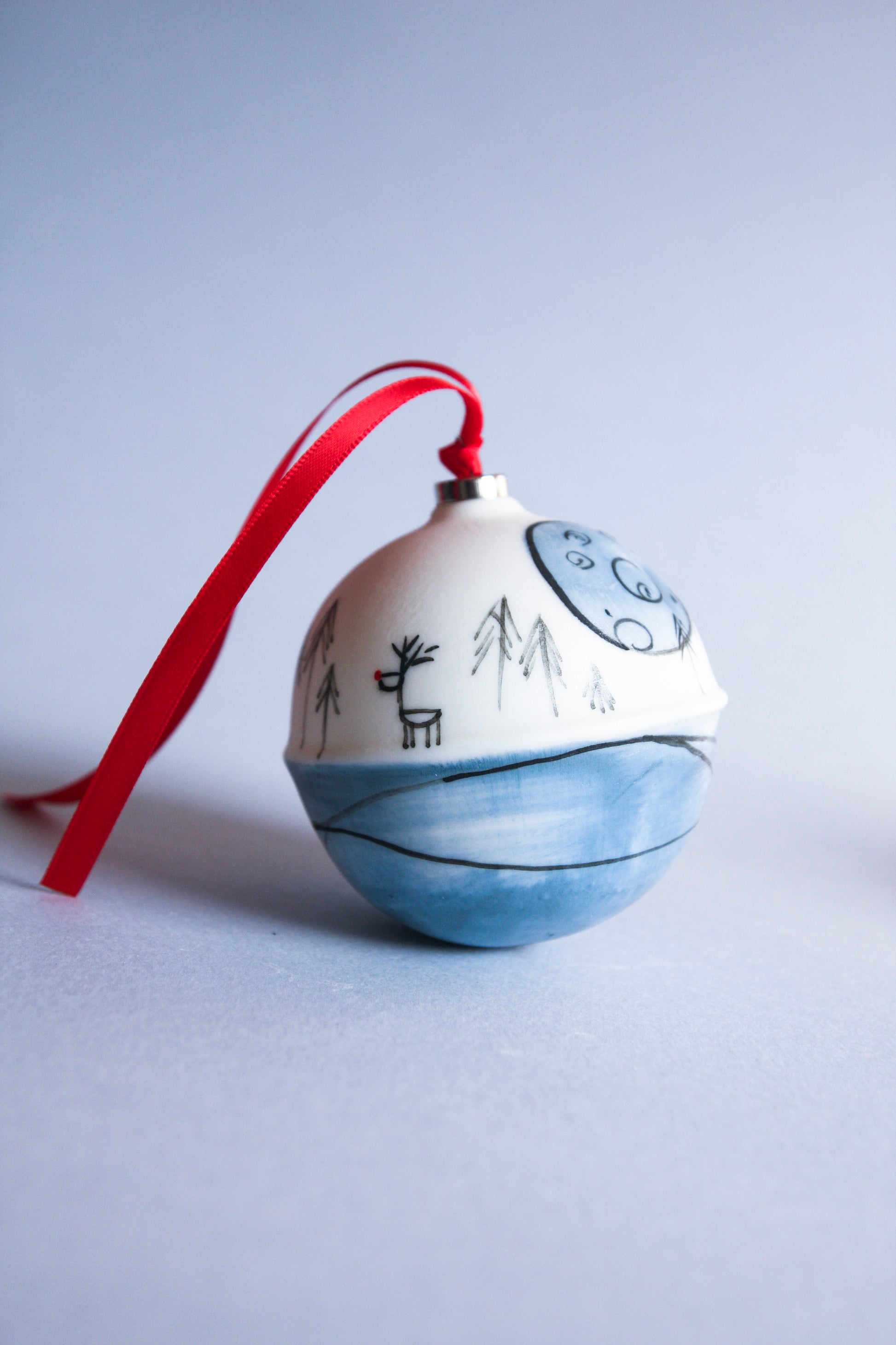 Reindeer at Full Moon- porcelain bauble