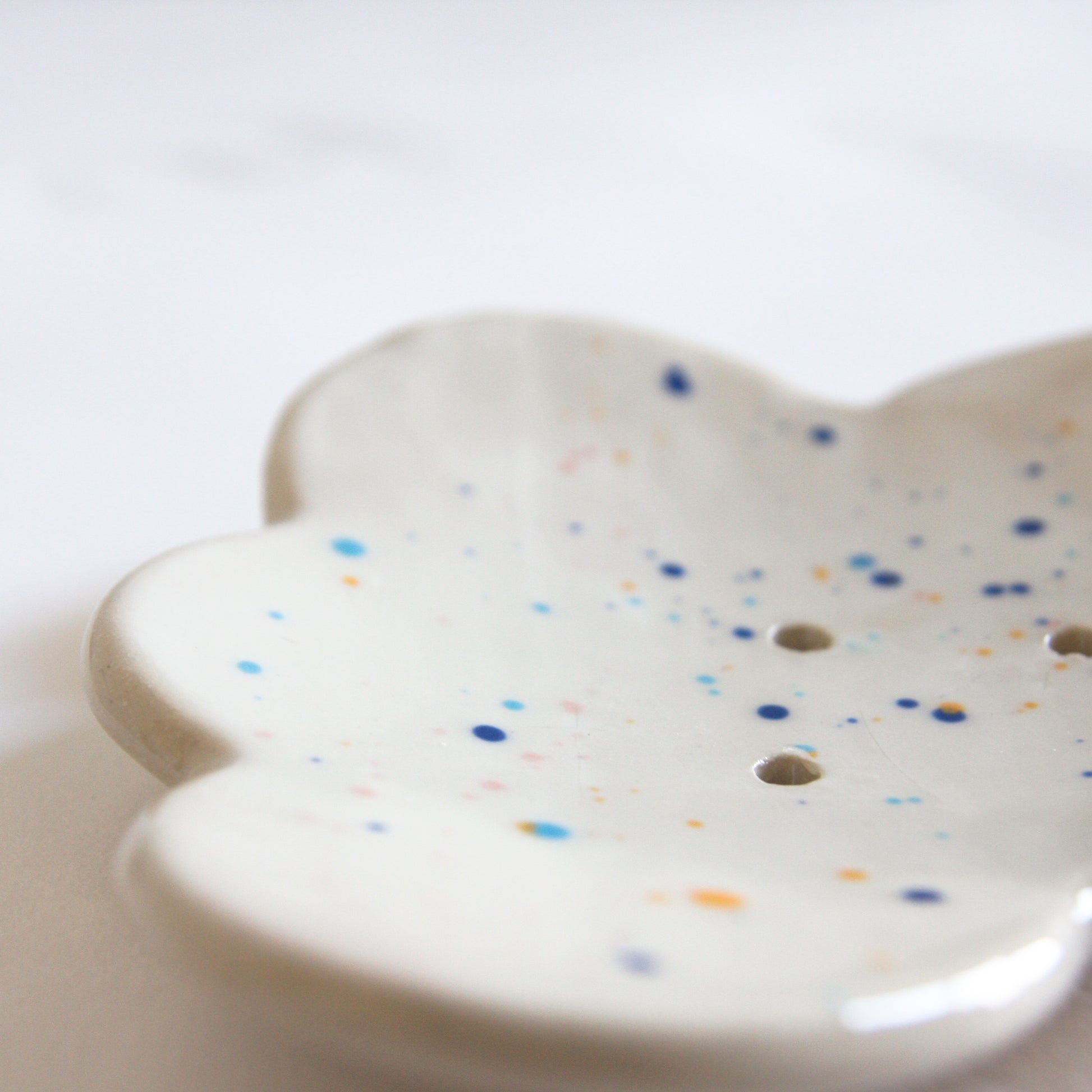 Cloud soap dish with colourful splatter design