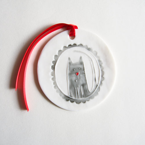 CAT disc ornament