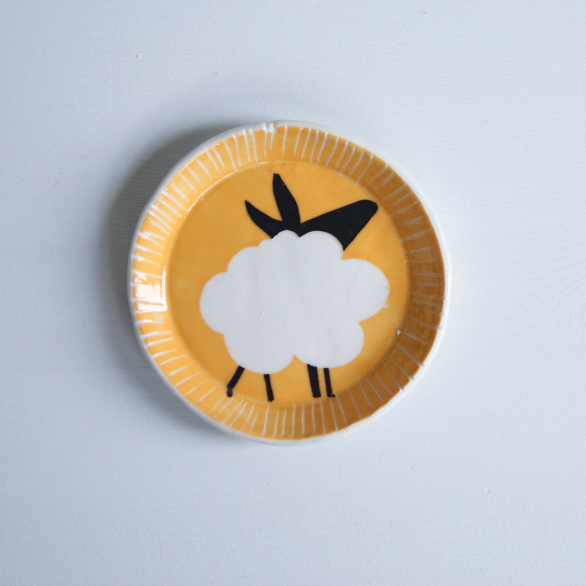 The Tangerine Sheep, tiny plate
